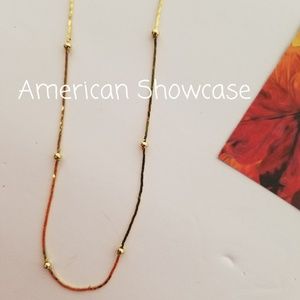 AMERICAN SHOWCASE NECKLACE GOLD NECKLACE